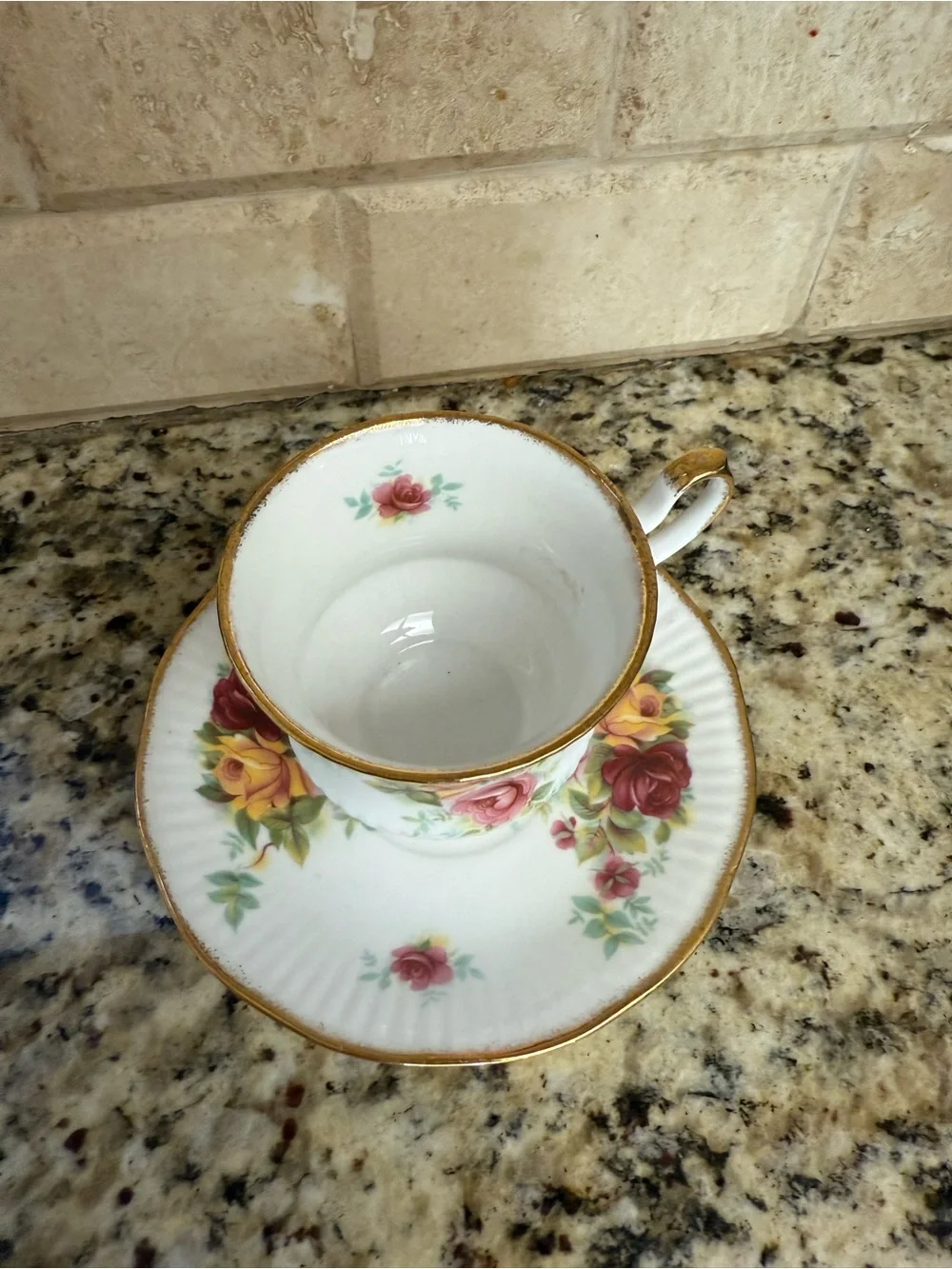Porcelain Teacup and Saucer Set with Pink and Yellow Rose Pattern